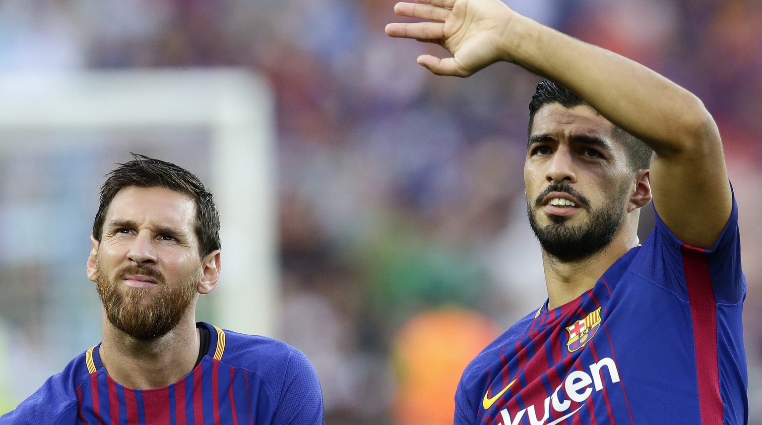 FC Barcelona&#039;s Lionel Messi, left, and Luis Suarez prior of the Joan Gamper trophy friendly soccer match between FC Barcelona and Chapecoense at the Camp Nou stadium in Barcelona, Spain, Monday,  ...