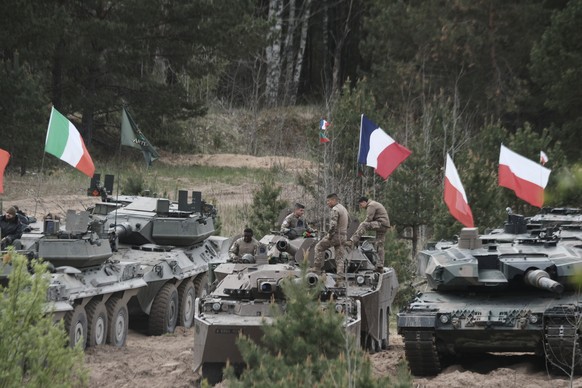 KEYPIX - epa12971028 Soldiers with their battle tanks participate in the NATO Iron Spear 2026 in Adazi training ground, Latvia, 18 May 2026. From 15 May to 22 May, the Adazi training ground hosts tank ...