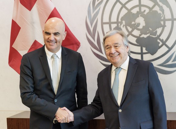 epa10506503 Switzerland?s President Alain Berset (L) with United Nations Secretary-General Antonio Guterres (R) at the start of a meeting at United Nations headquarters in New York, New York, USA, 06  ...