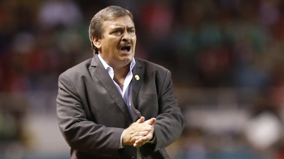 Costa Rica coach Oscar Ramirez gives instructions to his players during a 2018 Russia World Cup qualifying soccer match against Mexico, at the National Stadium in San Jose, Costa Rica, Tuesday, Sept.  ...