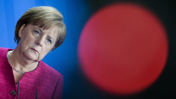 epa06809958 German Chancellor Angela Merkel addresses a joint press conference with NATO Secretary General Jens Stoltenberg (not in the picture) in Berlin, Germany, 15 June 2018. NATO Secretary Genera ...