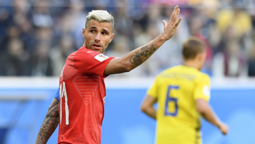 Switzerland&#039;s midfielder Valon Behrami reacts during the FIFA World Cup 2018 round of 16 soccer match between Sweden and Switzerland at the Krestovski Stadium, in St. Petersburg, Russia, Tuesday, ...