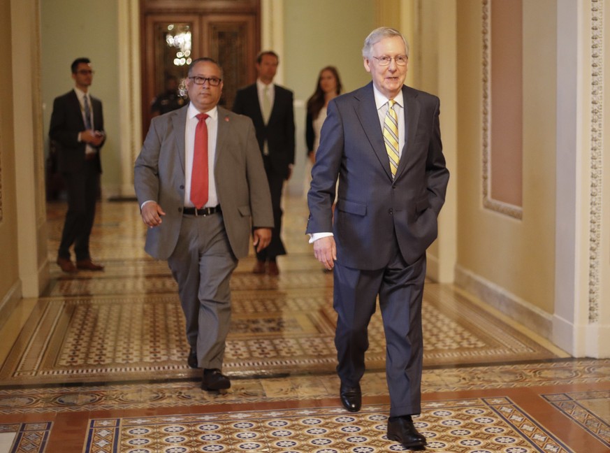 Senate Majority Leader Mitch McConnell of Ky. walks to his office on Capitol Hill in Washington Thursday, July 13, 2017. McConnell is planning on rolling out the GOP&#039;s revised health care bill, p ...