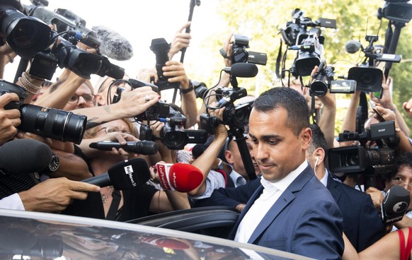 epa07795523 Lleader of the Five Star Movement (M5S), Italian Deputy Premier and Labor Minister Luigi Di Maio, gets into his car at the end of the meeting with the staff of his party, in Rome, Italy, 2 ...