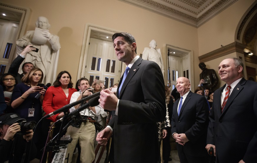 Speaker of the House Paul Ryan, R-Wis., joined at right by, House Ways and Means Committee Chairman Kevin Brady, R-Texas, and House Majority Whip Steve Scalise, R-La., meets reporters just after passi ...