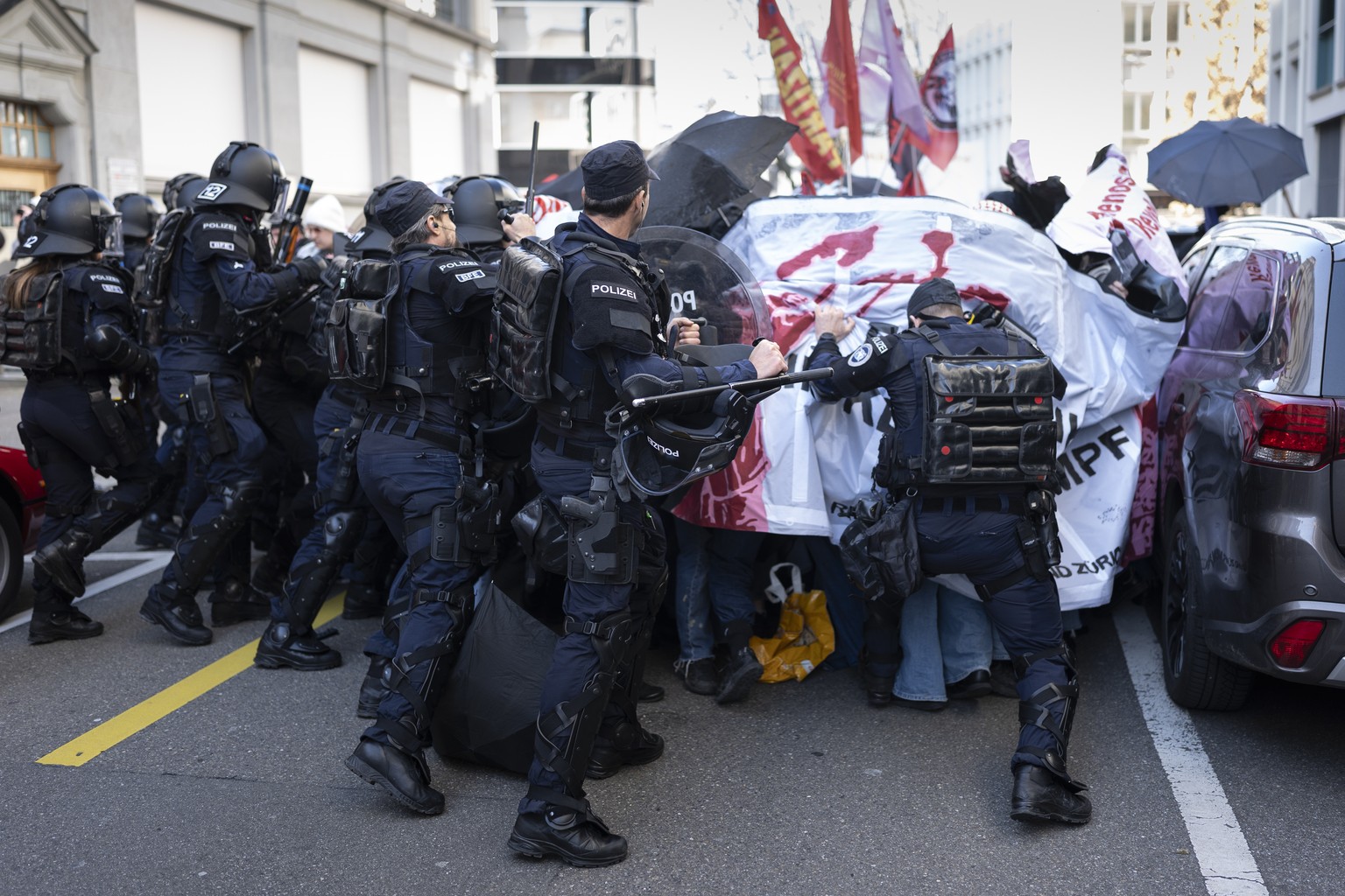 An estimated 1000 Women, lesbians, trans, inter- and non-binary people protest on Paradeplatz, at the unauthorised colourful and combative women&#039;s demonstration, on the occasion of International  ...