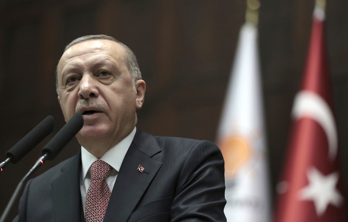 Turkey's President Recep Tayyip Erdogan delivers a speech to members of parliament of his ruling Justice and Development Party at the parliament in Ankara, Turkey, Tuesday, Nov. 27, 2018. Erdogan ...
