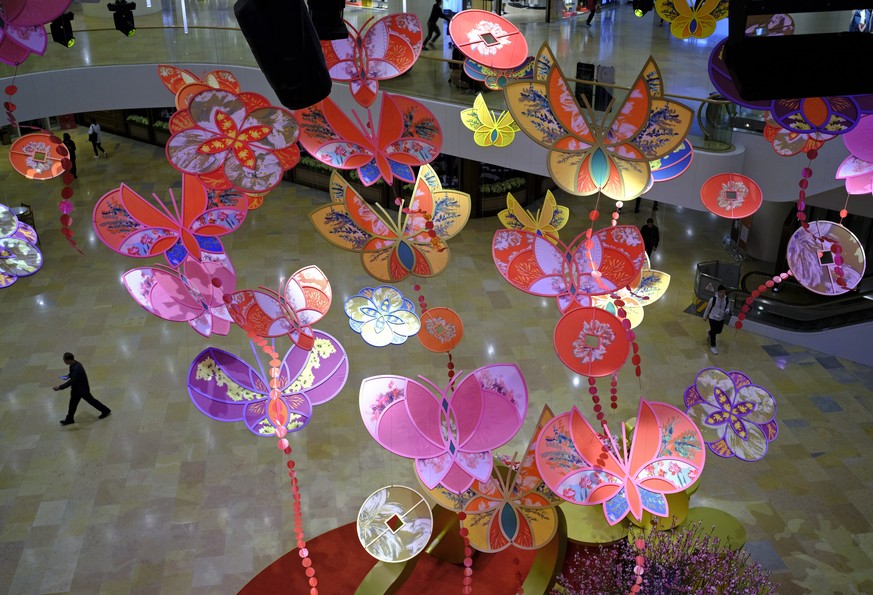 Chinese New Year decorations are displayed at a shopping mall in Hong Kong, Friday, Feb. 1, 2019. Chinese will celebrate the lunar new year on Feb. 5 this year which marks the Year of the Pig in the C ...