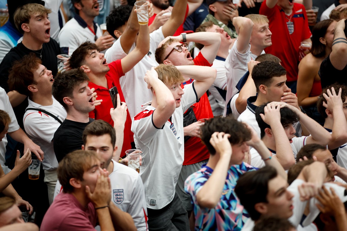 epa11447951 England fans react during the first half of a public screening of the UEFA EURO 2024 Round of 16 soccer match between England and Slovakia at Boxpark Wembley in London, Britain, 30 June 20 ...