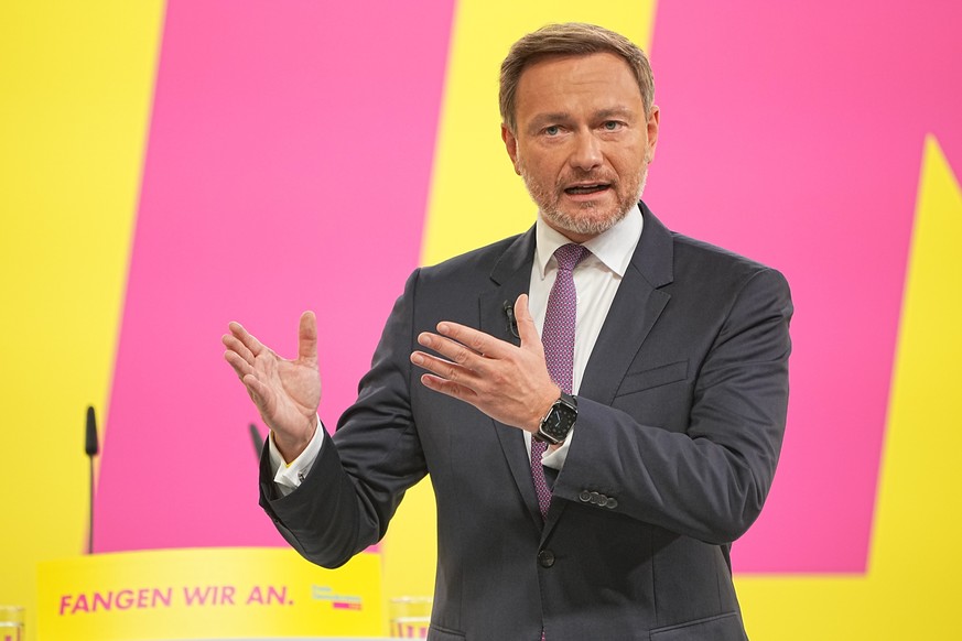 Christian Lindner, the leader of Germany&#039;s pro-business Free Democrats, addresses a convention of the party before it decides whether to approve a deal to form a new government with two center-le ...