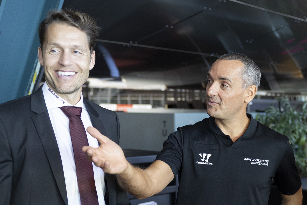 Geneve-Servette's Head coach Jan Cadieux, right, next to Marc Gautschi, left, Sport Director of Geneve-Servette HC, talks to the media, during a press conference of the presentation of the team G ...