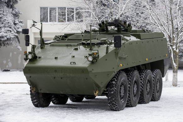 epa10401775 A &#039;Piranha-3 H&#039; transporters is displayed during the official ceremony of receiving &#039;Piranha-3 H&#039; transporters military vehicles at the Military Camp 142 in Chisinau, M ...