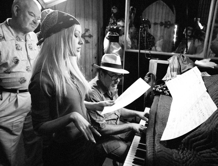 LOS ANGELES, CA - JUNE, 2000: American singer, songwriter, and television personality Christina Aguilera records &quot;Merry Christmas, Baby&quot; with American singer and songwriter Dr. John (1941-20 ...