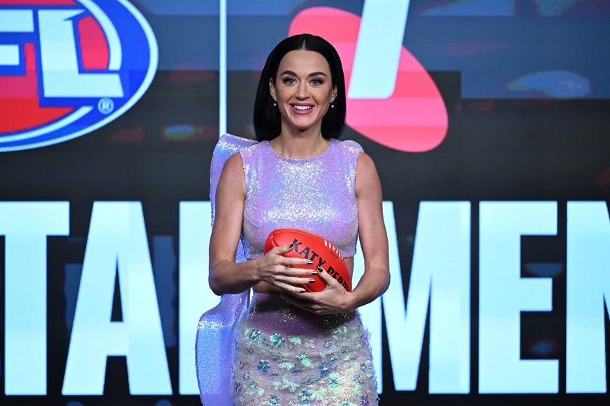 epa11625263 US pop superstar Katy Perry arrives on stage to a 2024 AFL Grand Final entertainment media preview at the MCG, in Melbourne, Australia, 26 September 2024. EPA/JAMES ROSS AUSTRALIA AND NEW  ...