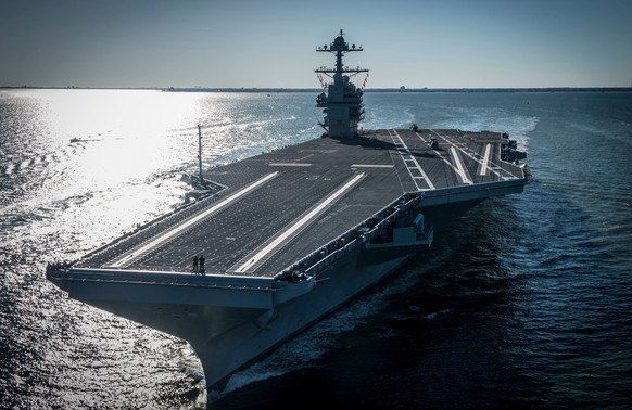 FILE - In this photo provided by the U.S. Navy, the USS Gerald R. Ford embarked on the first of its sea trials to test various state-of-the-art systems on its own power for the first time, April 8, 20 ...