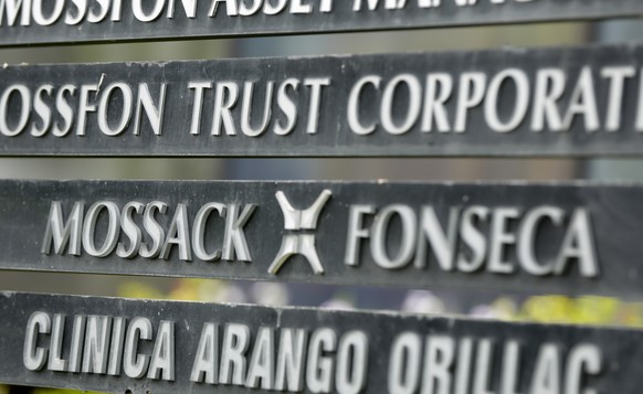 FILE - In this Monday, April 4, 2016 file photo, a marquee of the Arango Orillac Building lists the Mossack Fonseca law firm, in Panama City. Denmark will buy leaked data from a Panamanian law firm th ...