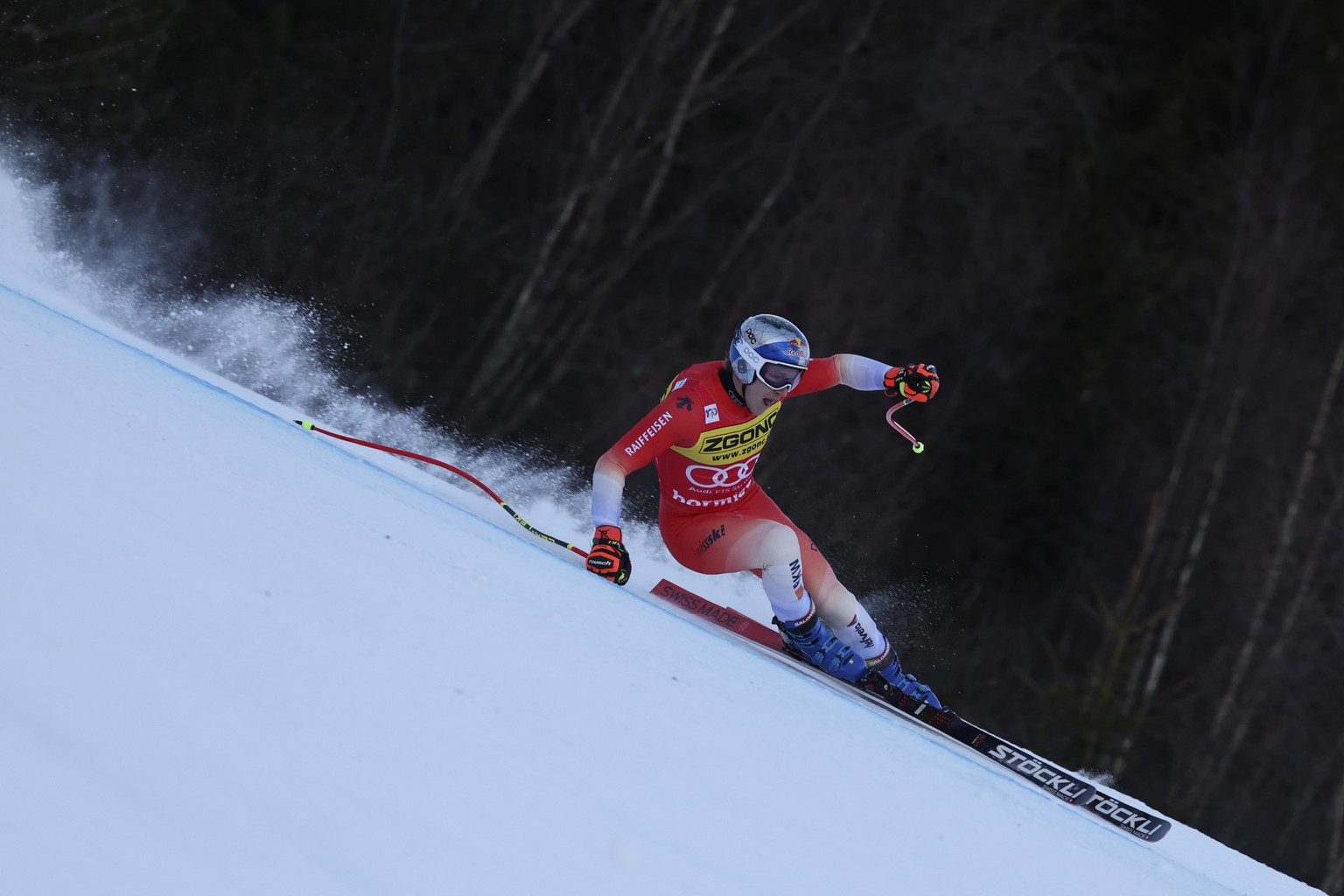 Switzerland's Marco Odermatt speeds down the course during an alpine ski, men's World Cup downhill training, in Bormio, Italy, Friday, Dec. 27, 2024. (AP Photo/Marco Trovati)