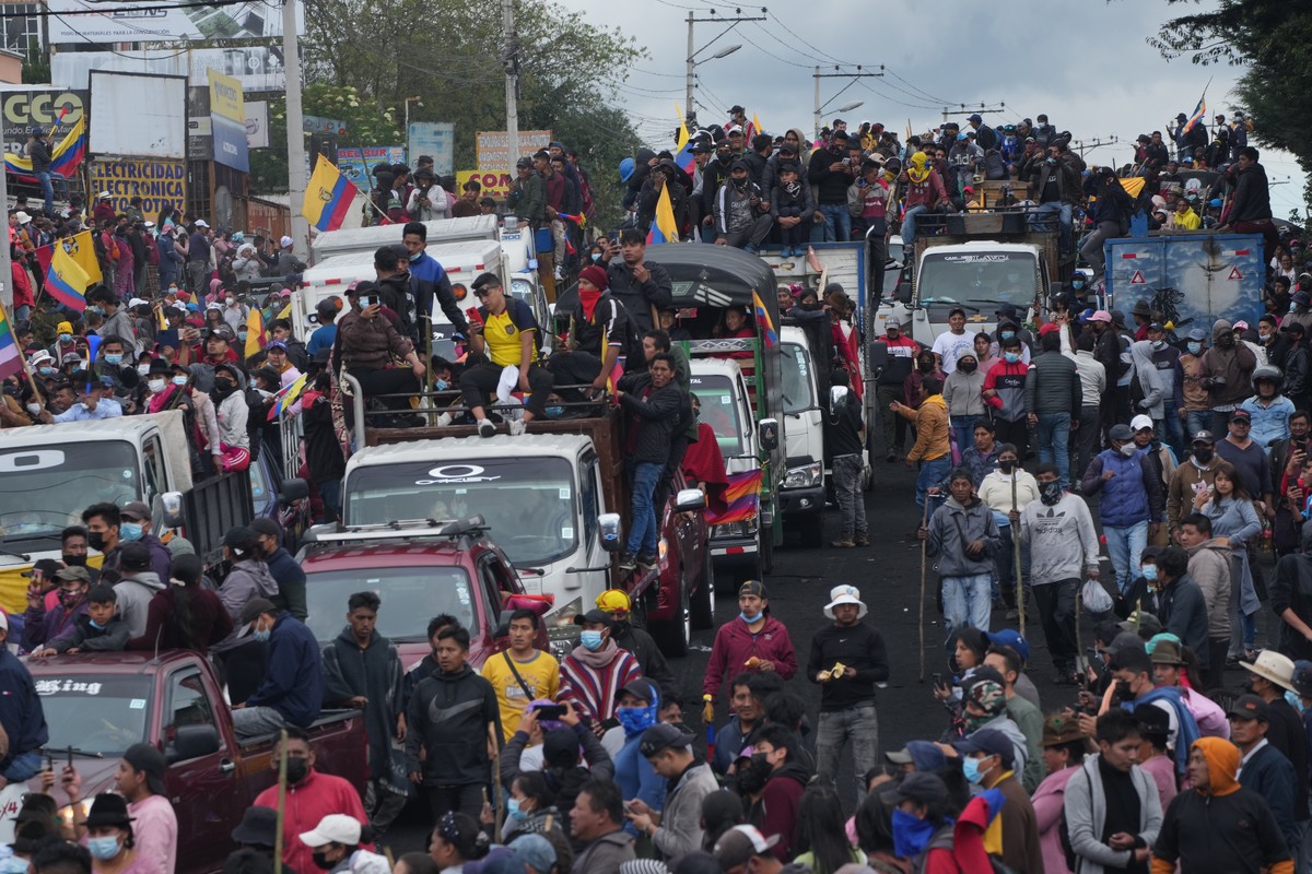 Demonstrators ride trucks as they arrive to the capital to protest against the government of President Guillermo Lasso, in Quito, Ecuador, Monday, June 20, 2022. (AP Photo/Dolores Ochoa)