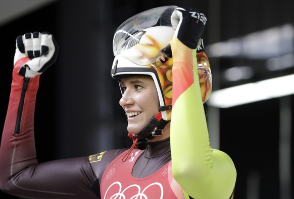 Natalie Geisenberger of Germany celebrates after her second run during the women&#039;s luge competition at the 2018 Winter Olympics in Pyeongchang, South Korea, Monday, Feb. 12, 2018. (AP Photo/Wong  ...