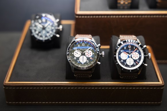 Watches made by Swiss watch manufacturer Breitling are seen on display in Bern, Switzerland, Friday, August 8, 2025. Since Thursday, 7 August, additional tariffs of 39 per cent have been imposed on go ...