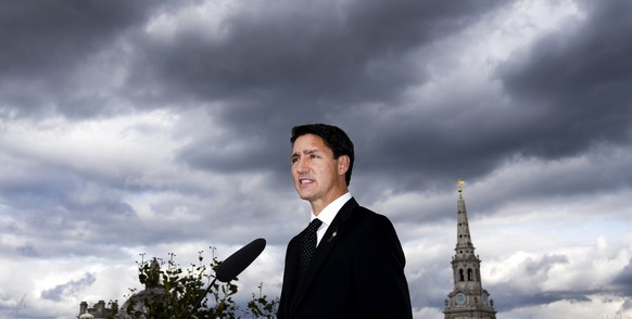 Canadian Prime Minister Justin Trudeau speaks with the Canadian media at Canada House after visiting 10 Downing Street to meet with Britain&#039;s Prime Minister Liz Truss in London, Sunday, Sept. 18, ...