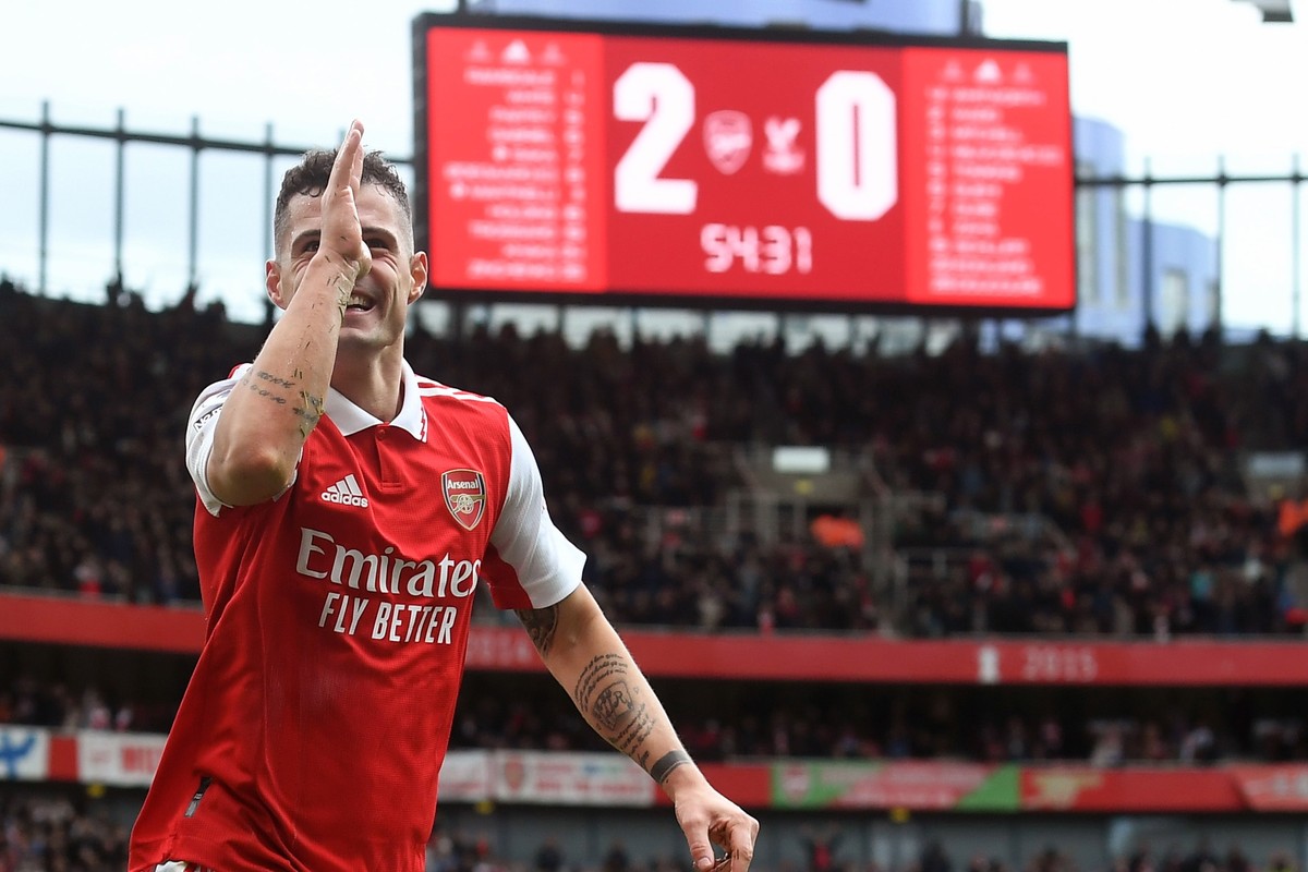 epa10532149 Granit Xhaka of Arsenal celebrates after scoring the team's third goal during the English Premier League soccer match between Arsenal FC and Crystal Palace in London, Britain, 19 Marc ...
