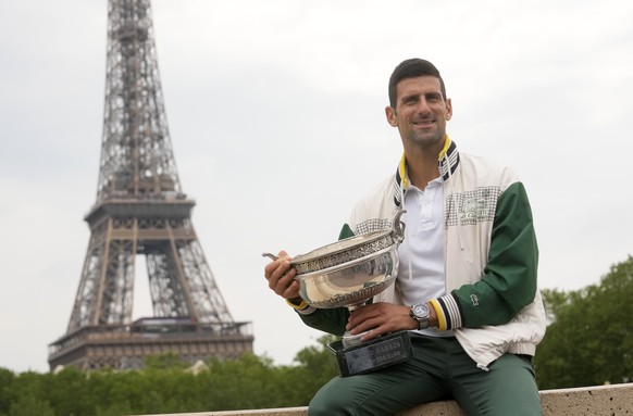 Serbia&#039;s Novak Djokovic poses with his trophy one day after winning the French Open tennis tournament in Paris, Monday, June 12, 2023. Novak Djokovic returned to No. 1 in the ATP rankings on Mond ...
