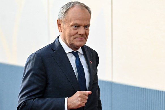 epa12422957 Polish Prime Minister Donald Tusk looks on upon his arrival for the 7th meeting of the European Political Community (EPC) in Copenhagen, Denmark, 02 October 2025. The summit, bringing toge ...