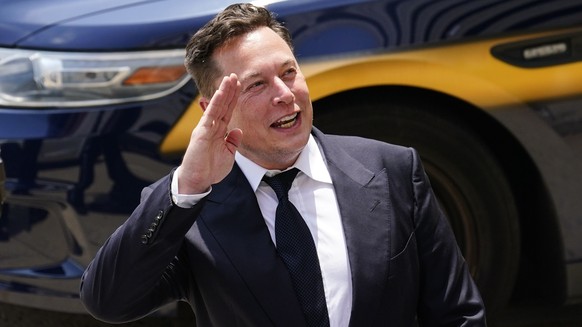 FILE - Tesla CEO Elon Musk departs from the justice center in Wilmington, Del., Tuesday, July 13, 2021. Democrats are hoping to raise revenue for their legislative agenda by taxing the assets of billi ...