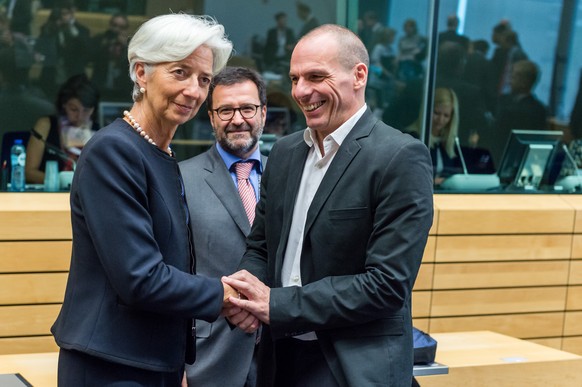 Managing Director of the International Monetary Fund Christine Lagarde, left, greets Greek Finance Minister Yanis Varoufakis during a meeting of eurozone finance ministers in Brussels on Thursday, Jun ...