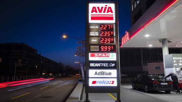 A panel showcases the fuel prices in Swiss francs at an AVIA petrol station in Zurich, Switzerland, on Wednesday, March 9, 2022. (KEYSTONE/Michael Buholzer)