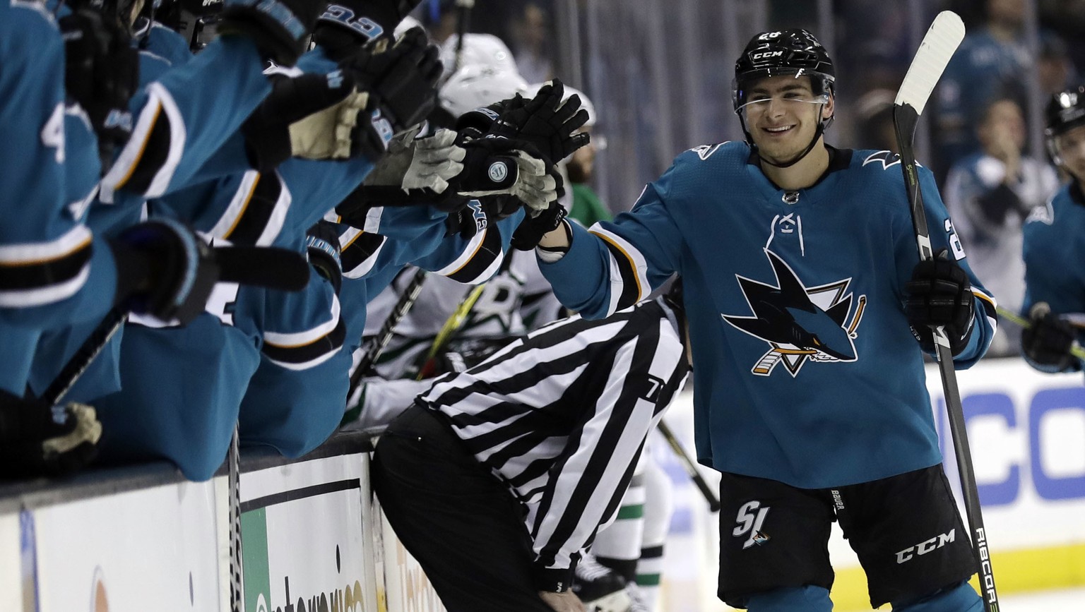 San Jose Sharks&#039; Timo Meier, right, celebrates with teammates after scoring against the Dallas Stars during the first period of an NHL hockey game Tuesday, April 3, 2018, in San Jose, Calif. (AP  ...