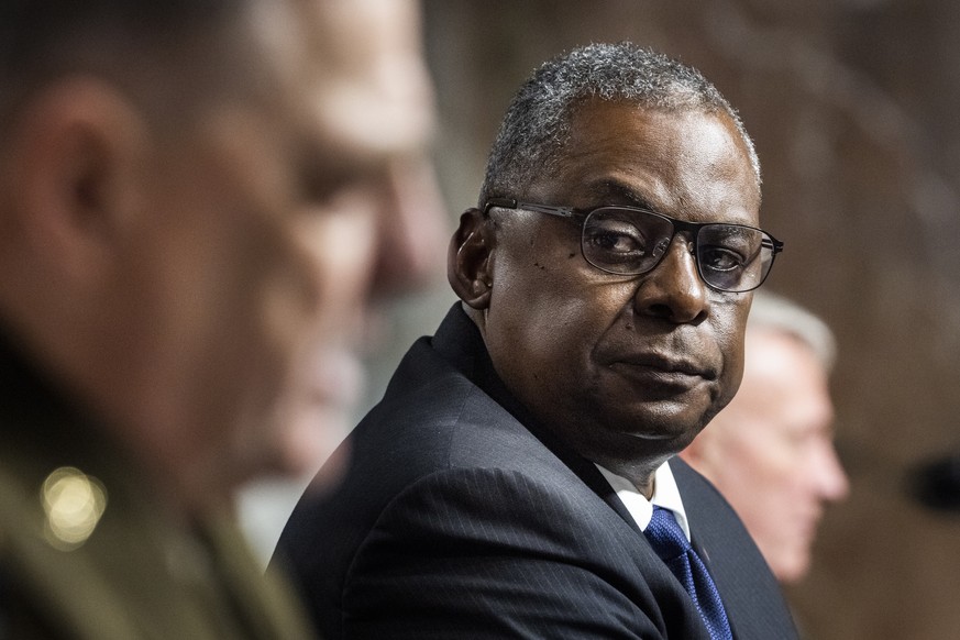 epa09492947 Defense Secretary Lloyd Austin (R) testifies before a Senate Armed Services committee hearing on the conclusion of military operations in Afghanistan in the Dirksen Senate Office Building  ...