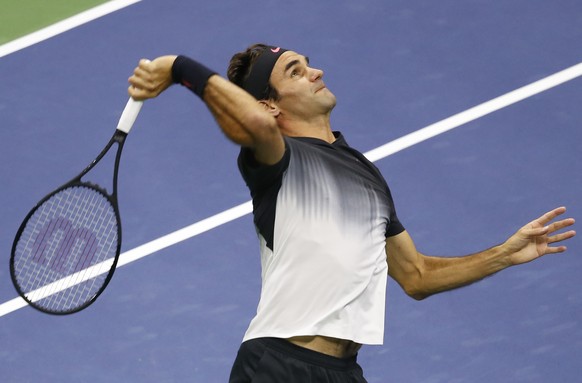 Roger Federer, of Switzerland, serves to Juan Martin del Potro, of Argentina, during a quarterfinal at the U.S. Open tennis tournament in New York, Wednesday, Sept. 6, 2017. (AP Photo/Kathy Willens)