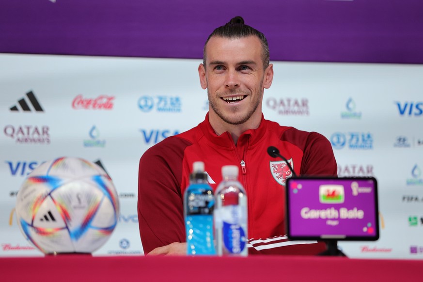 epa10315988 Gareth Bale of Wales smiles during a press conference at the Qatar National Convention Center (QNCC) in Doha, Qatar, 20 November 2022. Wales will face the USA in their first group B match  ...