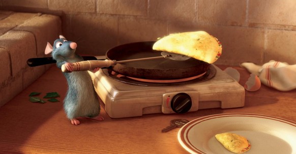 This image, provided by Disney, the character Remy makes omelettes in the new animated film "Ratatouille," a Disney Pixar production. (AP Photo/Disney) **NO SALES**