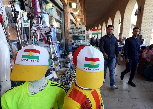 epa06222150 A hat with Kurdish flag on sale at the old city of Erbil, Kurdistan region in northern Iraq, 23 September 2017. The Kurdistan region is an autonomous region in northern Iraq since 1991, wi ...