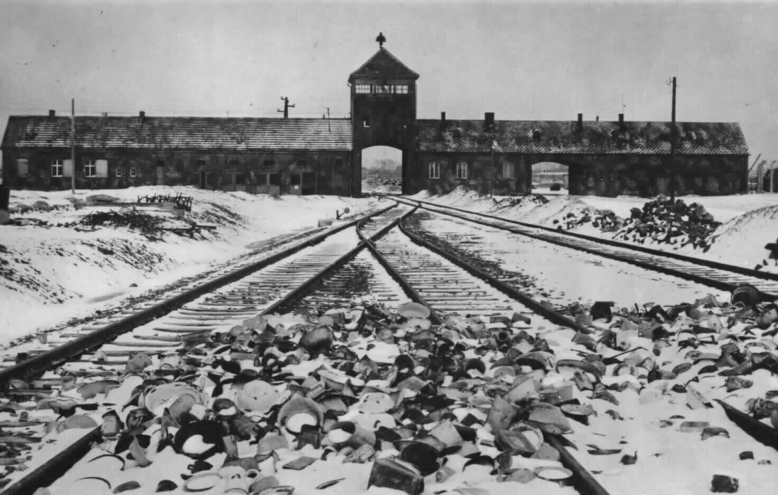 epa03079620 (FILE) An undated handout photo provided by the Wiener Library shows the gate tower, ramp and railway line at the Auschwitz-Birkenau Nazi death camp. Germany on 20 January 2012 marked the  ...