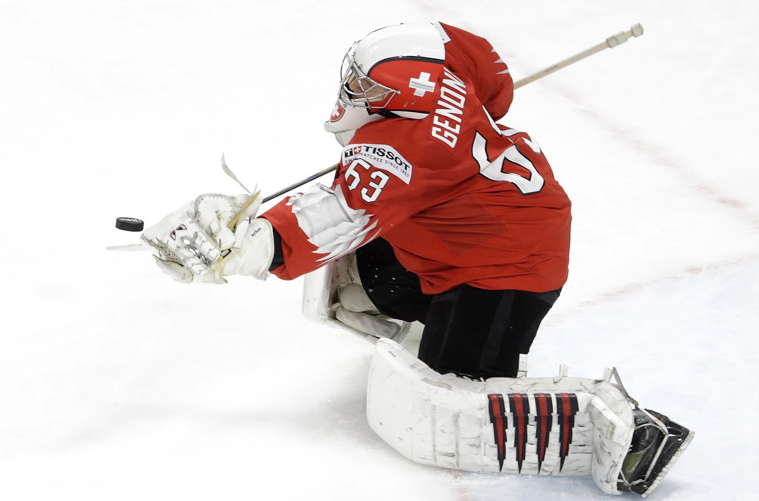 Switzerland&#039;s Leonardo Genoni saves during the Ice Hockey World Championships semifinal match between Canada and Switzerland at the Royal arena in Herning, Denmark, Saturday, May 19, 2018. (AP Ph ...