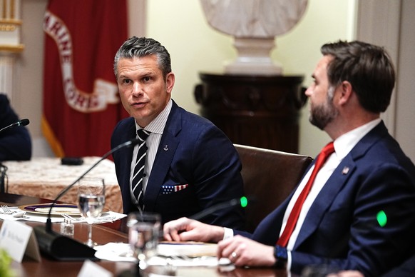 epa12511091 US Secretary of Defense Pete Hegseth (L) speaks as Vice President JD Vance (R) looks on during a bilateral lunch with Prime Minister of Hungary Viktor Orban and US President Donald J Trump ...