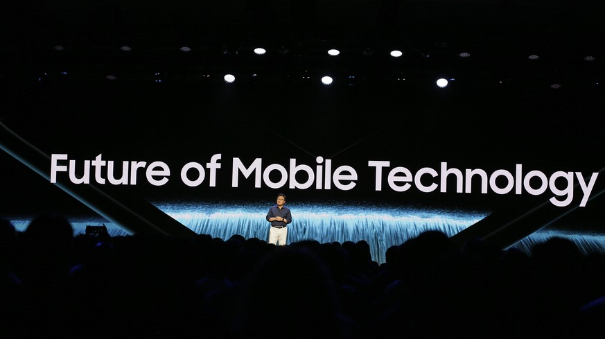 Samsung CEO DJ Koh speaks during the keynote address of the Samsung Developer Conference, Wednesday, Nov. 7, 2018, in San Francisco. (AP Photo/Eric Risberg)