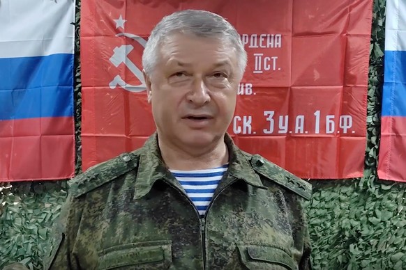 In this image made from video and provided by the Russian Defense Ministry Press Service, on June 23, 2023, Lt. Gen. Vladimir Alekseyev speaks to servicemen in an undisclosed location. (Russian Defens ...