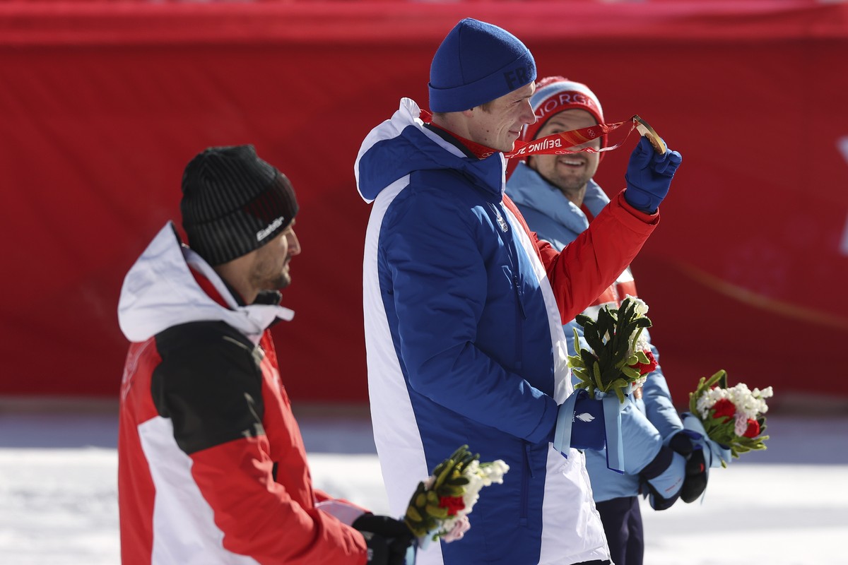 From left, Johannes Strolz, of Austria, silver, Clement Noel, of France, gold, and Sebastian Foss-Solevaag, of Norway, bronze, during the medal ceremony for the men's slalom at the 2022 Winter Ol ...