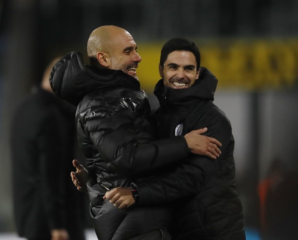 Josep Guardiola manager of Manchester City celebrates with assistant Mikel Arteta during the Premier League match at Turf Moor, Burnley. Picture date: 3rd December 2019. Picture credit should read: Si ...