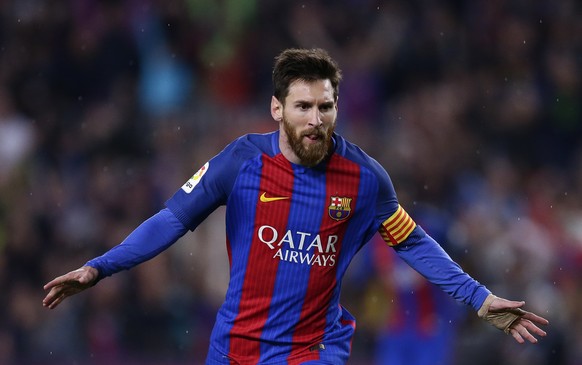 FC Barcelona&#039;s Lionel Messi celebrates after scoring during the Spanish La Liga soccer match between FC Barcelona and Real Sociedad at the Camp Nou stadium in Barcelona, Spain, Saturday, April 15 ...