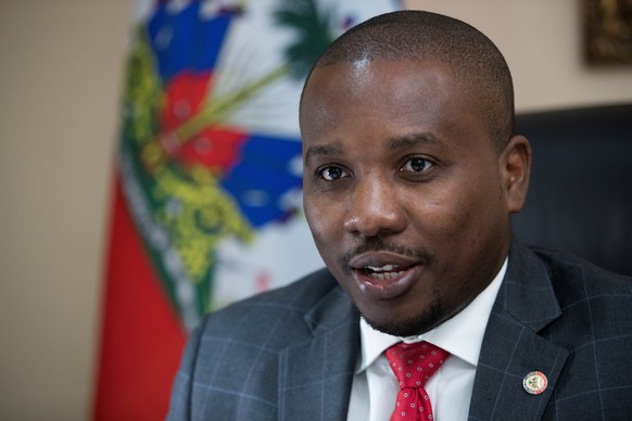 epa09328524 Then Foreign Minister of Haiti, Claude Joseph, speaks during an interview in Port-au-Prince, Haiti, 13 February 2021 (reissued 07 July 2021). Claude Joseph serves as the acting President o ...