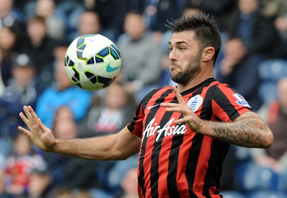 FILE - In this Saturday, April 4, 2015 file photo, QPR&#039;s Charlie Austin controls the ball during the English Premier League soccer match between West Bromwich Albion and Queens Park Rangers at th ...