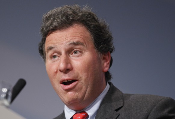 FILE - In this Monday, Oct. 4, 2010 file photo, Oliver Letwin, a Cabinet office minister, speaks at the Conservative party conference in Birmingham, England. A racism-tinged memo written 30 years ago  ...