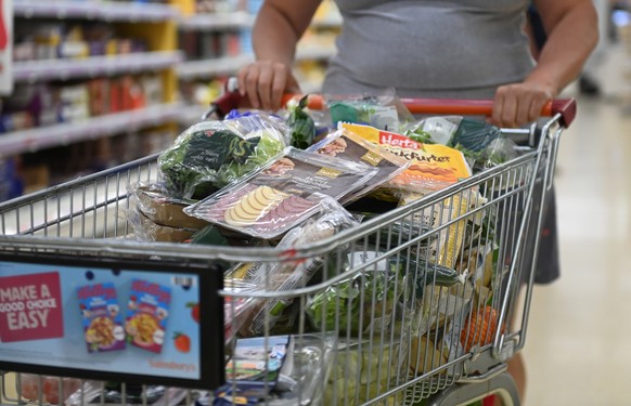 epa10027696 A shopping trolley full of food at a supermarket in London, Britain, 22 June 2022. UK inflation has risen to 9.1 percent causing food prices to rise at the fastest rate in 40 years accordi ...