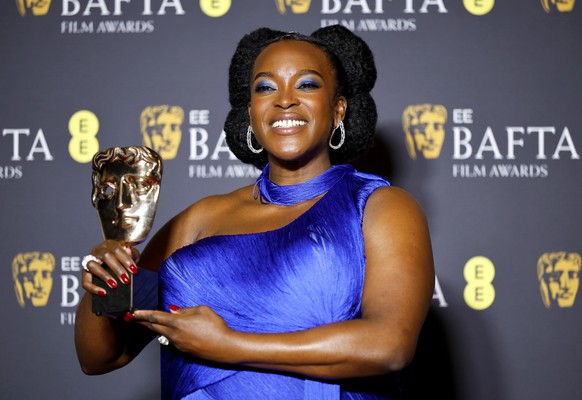 epa12769463 Wunmi Mosaku poses in the press room after winning the Best Supporting Actress award for 'Sinners' during the EE BAFTA Film Awards 2026 at the Royal Festival Hall in London, Brit ...